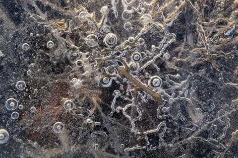 Texture abstract closeup background ice with grooves, furrows, and bubbles of Foto stock