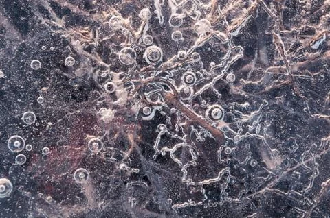 Texture abstract closeup background ice with grooves, furrows, and bubbles of Foto stock
