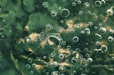 Texture abstract closeup background ice with grooves, furrows, and bubbles of Foto stock