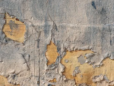 Texture of an aged rough wall with peeled paint Stock Photos