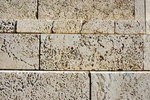 Texture of the ancient stone wall of the ancient city Stock Photos