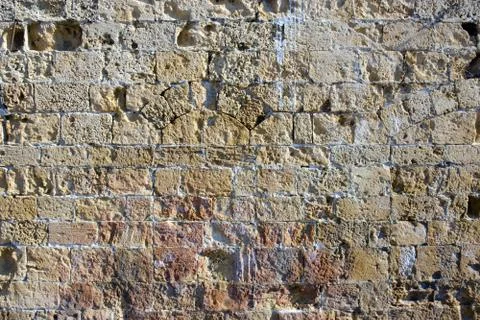 Texture of the ancient stone wall of the ancient city Stock Photos