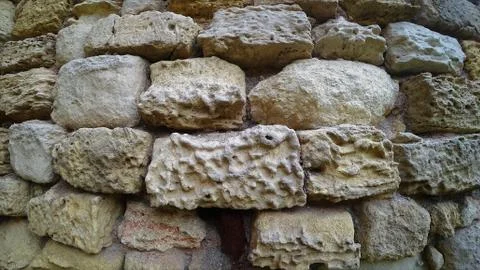 Texture of ancient stone wall Stock Photos