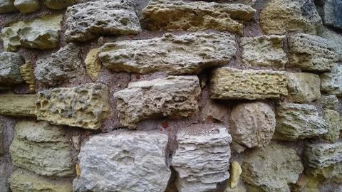 Texture of ancient stone wall Stock Photos