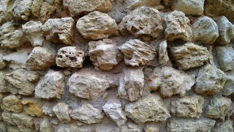 Texture of ancient stone wall Stock Photos