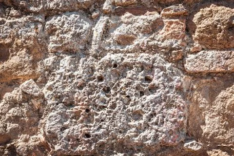 Texture of ancient wall build from bricks and stones Stock Photos