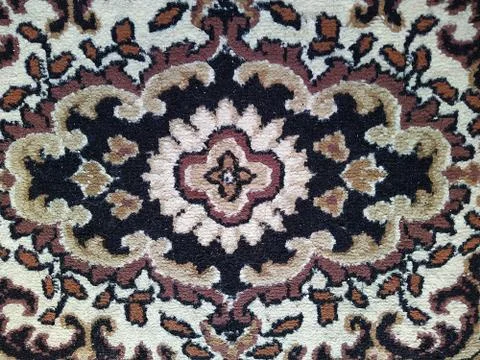 Texture and background of a classic old carpet with patterns Stock Photos