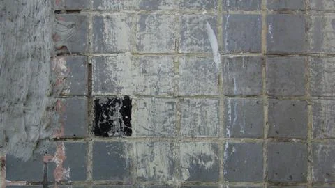 Texture and background of old and small tiles on the facade of the building Foto stock