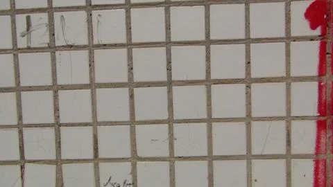 Texture and background of old and small tiles on the facade of the building Stock Photos