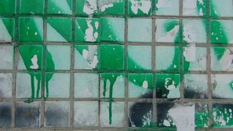 Texture and background of old and small tiles on the facade of the building 스톡 사진