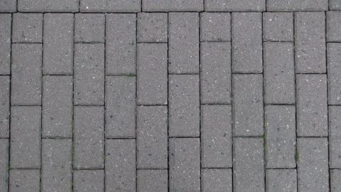Texture and background of pavement of stone slabs in the city Stock Photos