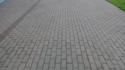 Texture and background of pavement of stone slabs in the city Stock Photos