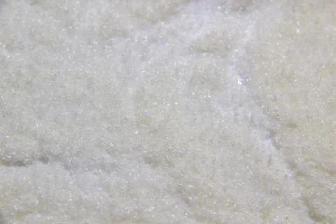A texture and background from sugar.  Cracks on texture with sugar Stock Photos
