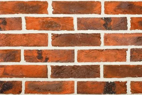 The texture and background of the wall with a decorative finish imitating a b Stock Photos