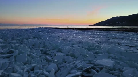 Texture and pattern formed by ice debris on the shore of a large lake or river Stock Footage 220051718