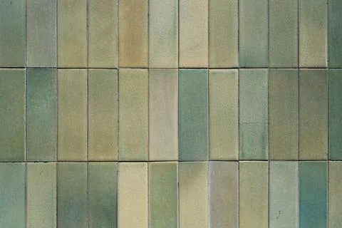 Texture and pattern of green ceramic wall tiles, grunge square mosaic. 库存照片