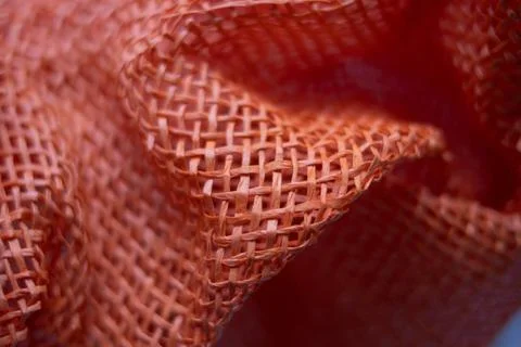 Texture and pattern of Orange hessian, also known as burlap Stock Photos