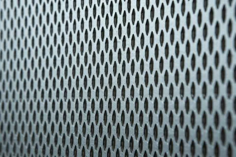 The texture and pattern of perforated metal. Stock Photos