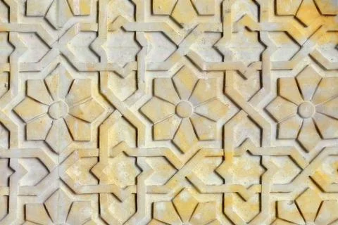 Texture arabic flower pattern on the stone wall. Texture on the concrete surf Stock Photos
