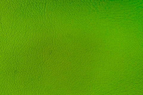 Texture of artificial leather. Background or backdrop of green leatherette. Stock Photos