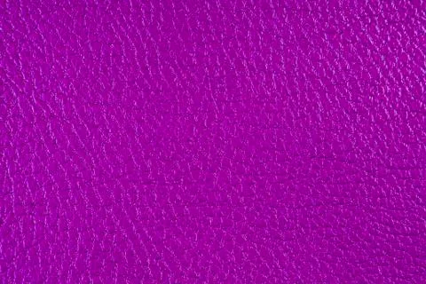 Texture of artificial leather. Lilac background or backdrop of leatherette. Stock Photos