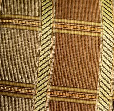 Texture of the back of the brown sofa in the room Stock Photos