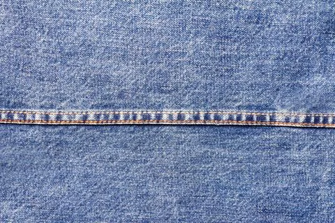 Texture backdrop photo of blue colored denim cloth. 스톡 사진
