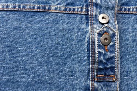 Texture backdrop photo of blue colored denim cloth. Stock Photos