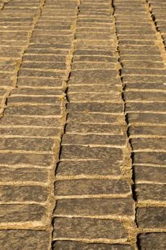 Texture background of cobblestone paved street Stock Photos