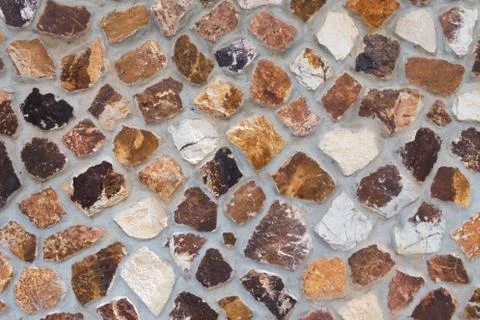 Texture background of concrete and brown stone rock wall or pavement Stock Photos