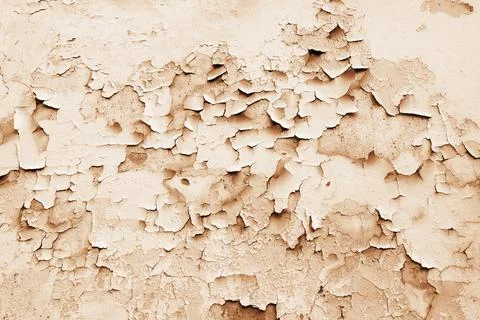 Texture background cracked peeling paint plaster. Wallpaper Stock Photos