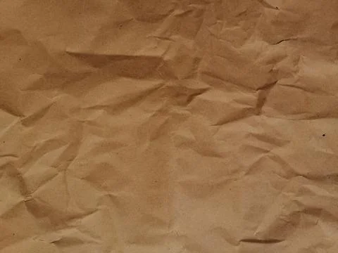 Texture background of dark brown crumple old paper Foto stock