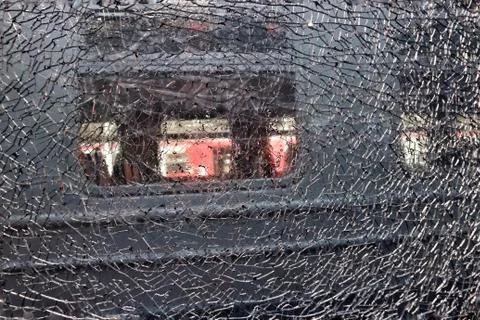 Texture background for design of network of cracks of broken glass. Stock Photos