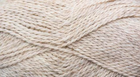 Texture background. Knitted pattern with metallic thread Foto stock