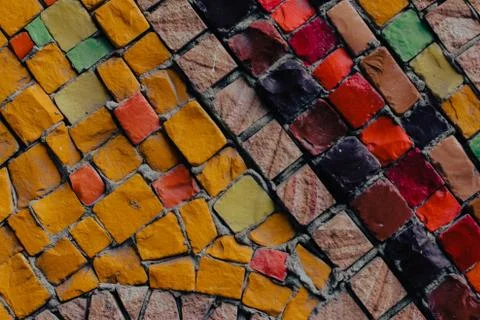 Texture background of mosaic multi colored stones on the wall. Colorful texture  Stock Photos