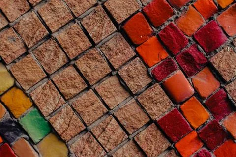 Texture background of mosaic multi colored stones on the wall. Colorful texture  Stock Photos