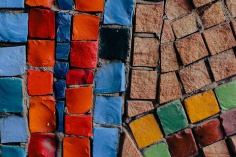 Texture background of mosaic multi colored stones on the wall. Colorful texture  Stock Photos