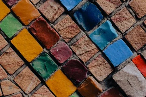 Texture background of mosaic multi colored stones on the wall. Colorful texture  Stock Photos