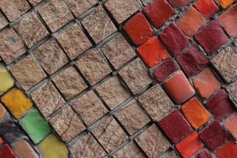 Texture background of mosaic multi colored stones on the wall. Colorful texture  Stock Photos