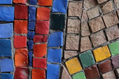 Texture background of mosaic multi colored stones on the wall. Colorful texture  Stock Photos
