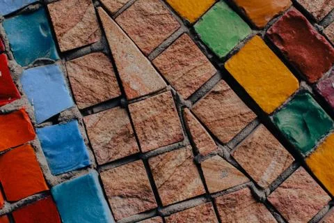 Texture background of mosaic multi colored stones on the wall. Colorful texture  Stock Photos
