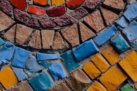 Texture background of mosaic multi colored stones on the wall. Colorful texture  Stock Photos