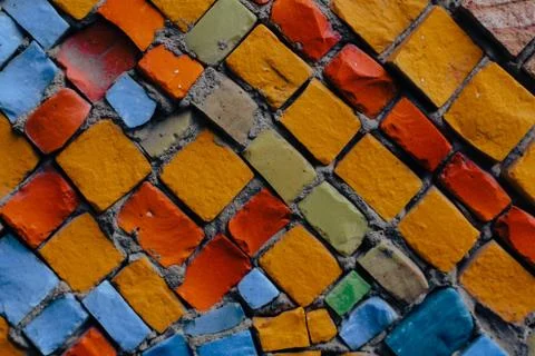 Texture background of mosaic multi colored stones on the wall. Colorful texture  Stock Photos