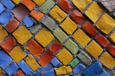 Texture background of mosaic multi colored stones on the wall. Colorful texture  Stock Photos