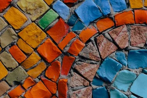 Texture background of mosaic multi colored stones on the wall. Colorful texture  Stock Photos