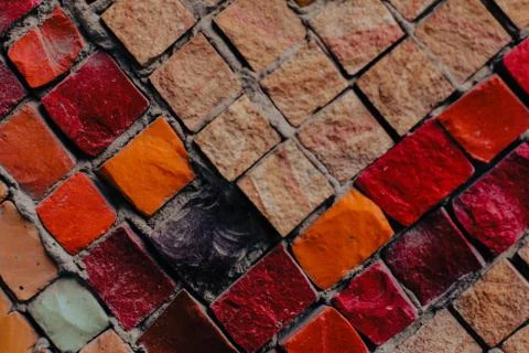 Texture background of mosaic multi colored stones on the wall. Colorful texture  Stock Photos