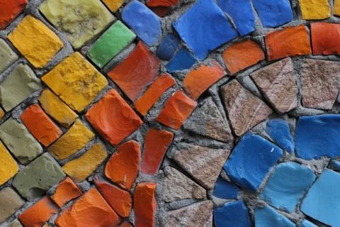 Texture background of mosaic multi colored stones on the wall. Colorful texture  Stock Photos