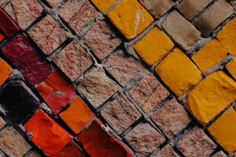 Texture background of mosaic multi colored stones on the wall. Colorful texture  Stock Photos