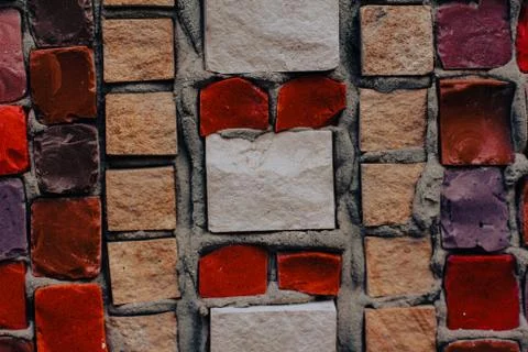 Texture background of mosaic multi colored stones on the wall. Colorful texture  Stock Photos