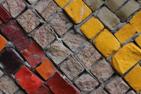 Texture background of mosaic multi colored stones on the wall. Colorful texture  Stock Photos